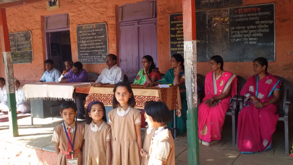 Trustees and teachers at a rural school development meeting in Chandwad, Nashik